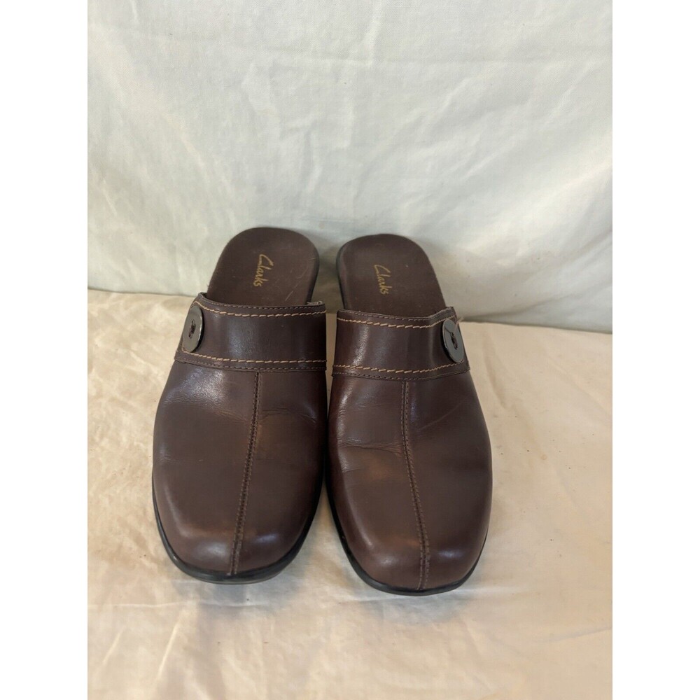 Clarks Mules Brown women's size 7 with button detail